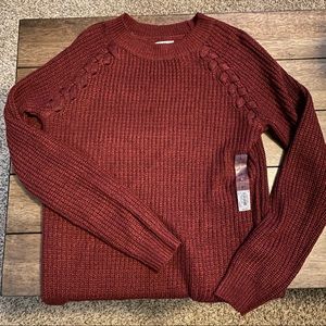 Red Sweater with Braided Arm Detail